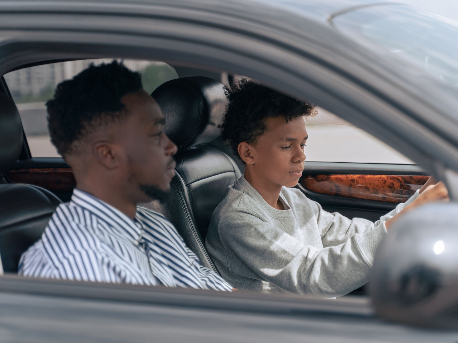 An instructor teaching a learner during a lesson