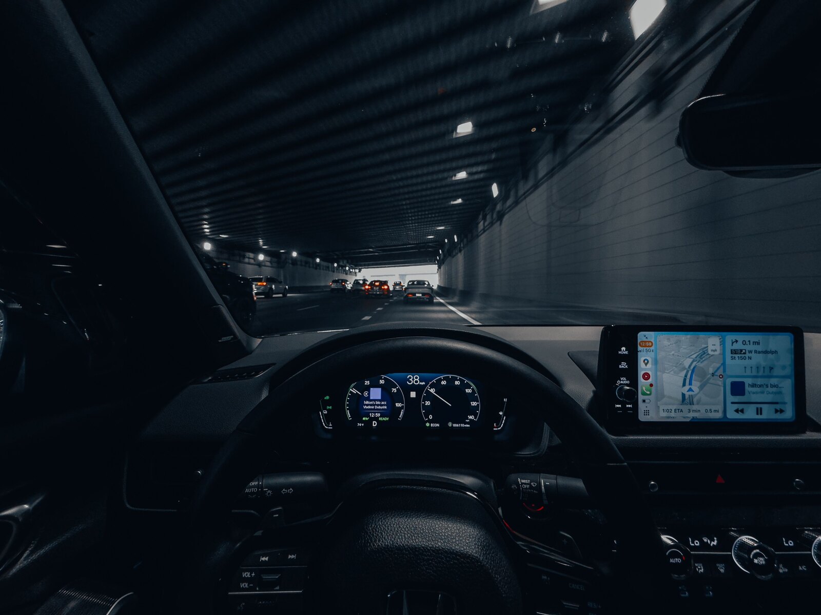 The view of the road ahead from the driver seat